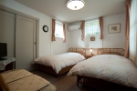 Western-style room  on a mezzanine level | Innoshima Pension Shirataki-sanso